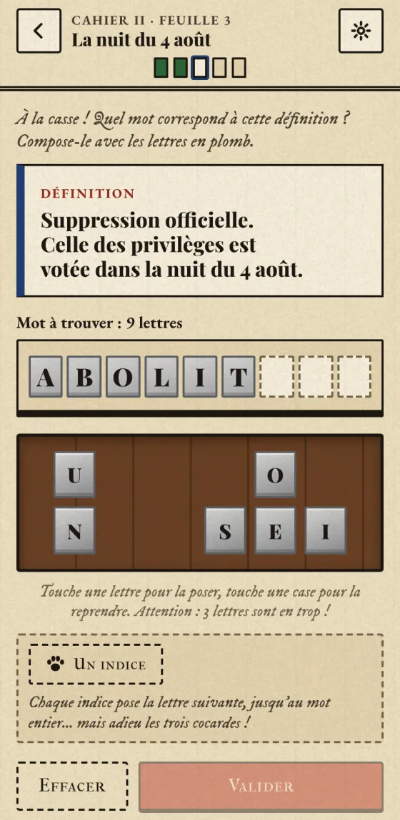 Sur téléphone : le mot ABOLITION en cours de composition dans la casse