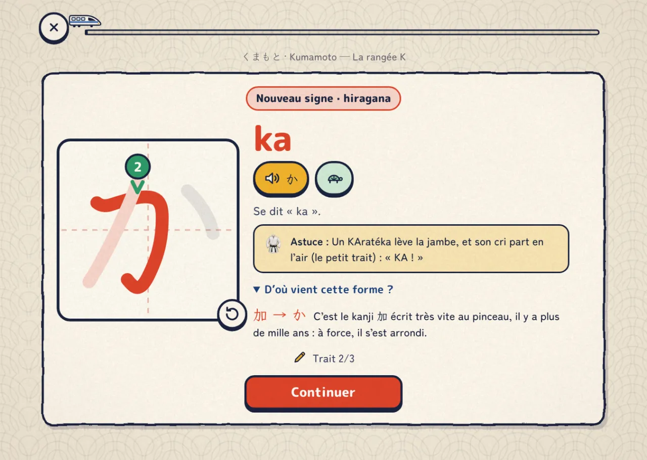 Gare 2 : la carte du hiragana か, en cours de tracé sur son carré d'écriture, avec son astuce et le kanji 加 dont il vient